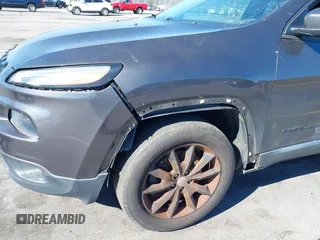 2014 Jeep Cherokee Latitude with VIN 1C4PJMCS3EW298340, listed as a IAAI auction lot 41708488 with 217,438 mi miles and . Bid and sale history available at DreamBid. Image 19.
