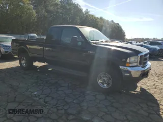 2002 Ford Super Duty F-250 XL with VIN 1FTNX21SX2EC00757, listed as a Copart auction lot 80952634 with 249,650 mi miles and Clean Title. Bid and sale history available at carsss.com. Image 4.