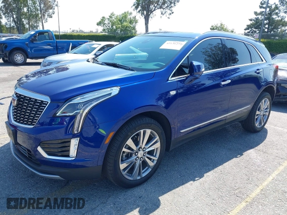 2023 Cadillac XT5 FWD Premium Luxury z VIN 1GYKNCRS3PZ176654, wystawiony jako IAAI lot #42136259 z przebiegiem 20 403 mil mil oraz . Historia ofert i sprzedaży dostępna na DreamBid. Obrazek 2.