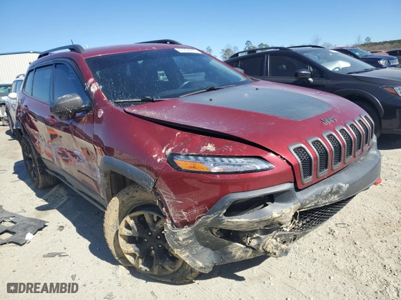 2015 Jeep Cherokee Trailhawk with VIN 1C4PJMBBXFW615145, listed as a Copart auction lot 47294225 with 99,662 mi miles and Salvage Title. Bid and sale history available at carsss.com. Image 4.