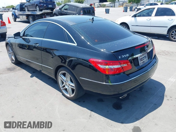 2013 Mercedes-Benz E 350 with VIN WDDKJ5KB3DF182531, listed as a IAAI auction lot 42460117 with 142,527 mi miles and . Bid and sale history available at DreamBid. Image 3.