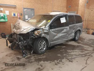 2015 Dodge Grand Caravan SE with VIN 2C4RDGBG1FR738659, listed as a IAAI auction lot 41547350 with 96,621 mi miles and . Bid and sale history available at DreamBid. Image 17.
