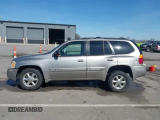 2002 GMC Envoy SLT z VIN 1GKDT13S122114452, wystawiony jako IAAI lot #42048616 z przebiegiem 259 545 mil mil oraz . Historia ofert i sprzedaży dostępna na DreamBid. Obrazek 15.
