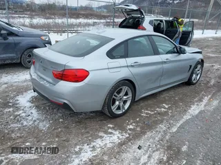 2016 BMW 4 Series 428i xDrive with VIN WBA4C9C53GG136870, listed as a IAAI auction lot 41410071 with 116,187 mi miles and . Bid and sale history available at DreamBid. Image 4.