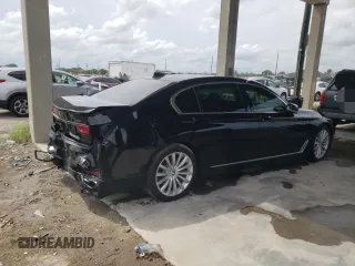 2017 BMW 7 Series 740i with VIN WBA7E2C31HG741176, listed as a Copart auction lot 65698233 with 27,332 mi miles. Bid and sale history available at carsss.com. Image 3.