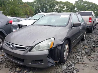 2006 Honda Accord EX-L z VIN 1HGCM56866A125228, wystawiony jako IAAI lot #42252525 z przebiegiem 254 398 mil mil oraz . Historia ofert i sprzedaży dostępna na DreamBid. Obrazek 17.