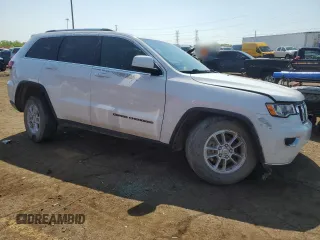 2020 Jeep Grand Cherokee Laredo E z VIN 1C4RJFAGXLC327107, wystawiony jako Copart lot #57259795 z przebiegiem 27 217 mil mil oraz Szkoda całkowita • Salvage title. Historia ofert i sprzedaży dostępna na DreamBid. Obrazek 4.