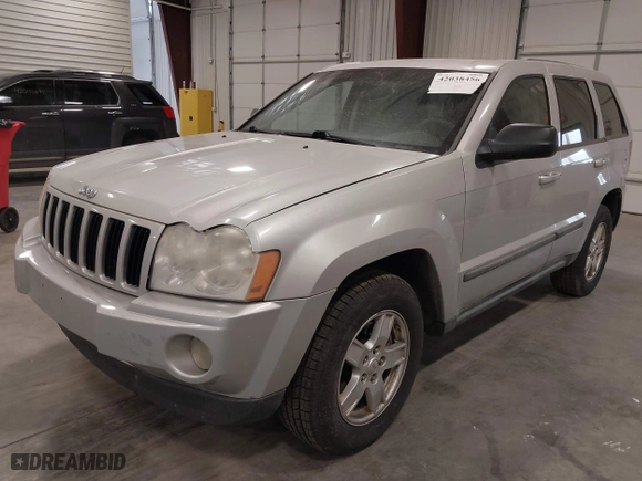 2007 Jeep Grand Cherokee Laredo with VIN 1J8GR48K57C687365, listed as a IAAI auction lot 42038456 with 162,343 mi miles. Bid and sale history available at carsss.com. Image 2.