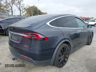 2016 Tesla Model X P90D with VIN 5YJXCAE45GF001485, listed as a IAAI auction lot 41994096 with 88,103 mi miles. Bid and sale history available at carsss.com. Image 4.