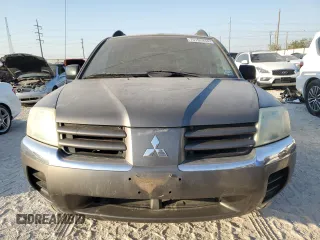 2004 Mitsubishi Endeavor LS with VIN 4A4MM21SX4E071998, listed as a Copart auction lot 75192444 with 215,916 mi miles and Salvage Title. Bid and sale history available at carsss.com. Image 5.