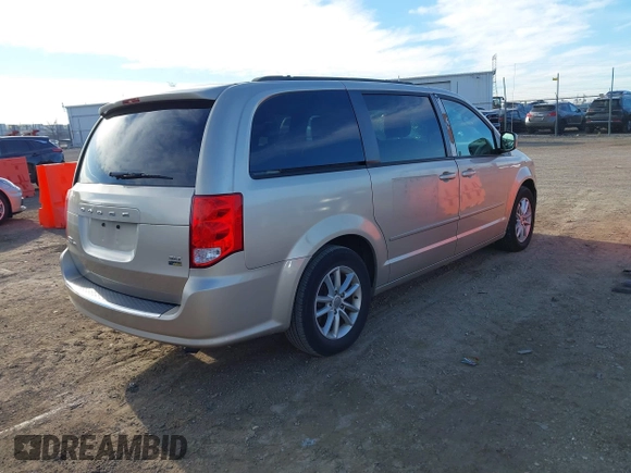 2014 Dodge Grand Caravan SXT with VIN 2C4RDGCG0ER210186, listed as a IAAI auction lot 40813319 with 100,230 mi miles and . Bid and sale history available at DreamBid. Image 4.