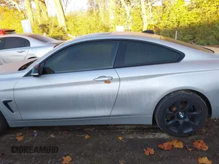 2015 BMW 4 Series 435i xDrive z VIN WBA3R5C5XFK371491, wystawiony jako IAAI lot #40755251 z przebiegiem 122 181 mil mil oraz . Historia ofert i sprzedaży dostępna na DreamBid. Obrazek 14.