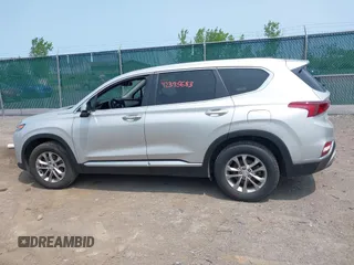 2019 Hyundai Santa Fe SE z VIN 5NMS2CAD2KH058961, wystawiony jako IAAI lot #42395683 z przebiegiem 81 228 mil mil oraz . Historia ofert i sprzedaży dostępna na DreamBid. Obrazek 14.