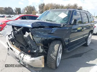 2005 Chevrolet Tahoe Z71 z VIN 1GNEC13T95R192599, wystawiony jako IAAI lot #41955397 z przebiegiem 179 292 mil mil oraz . Historia ofert i sprzedaży dostępna na DreamBid. Obrazek 17.