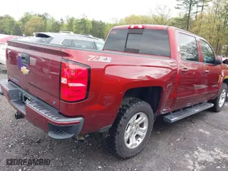 2017 Chevrolet Silverado 1500 LT with VIN 3GCUKREC8HG336120, listed as a IAAI auction lot 41919441 with 64,029 mi miles. Bid and sale history available at carsss.com. Image 4.