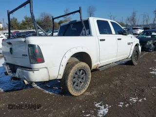 2014 Ram 1500 Express z VIN 1C6RR7KT5ES225661, wystawiony jako IAAI lot #41363288 z przebiegiem 147 841 mil mil oraz . Historia ofert i sprzedaży dostępna na DreamBid. Obrazek 4.
