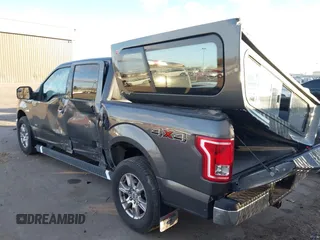 2015 Ford F-150 XLT with VIN 1FTEW1EP1FKE16670, listed as a IAAI auction lot 41120641 with 102,770 mi miles. Bid and sale history available at carsss.com. Image 3.