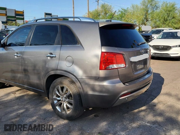 2011 Kia Sorento SX z VIN 5XYKW4A23BG164399, wystawiony jako Copart lot #60940845 z przebiegiem 196 401 mil mil oraz Czysty tytuł • Clean title. Historia ofert i sprzedaży dostępna na DreamBid. Obrazek 3.