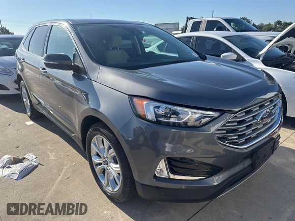 2021 Ford Edge Titanium with VIN 2FMPK3K96MBA51234, listed as a IAAI auction lot 42886659 with 74,183 mi miles and . Bid and sale history available at DreamBid. Image 4.