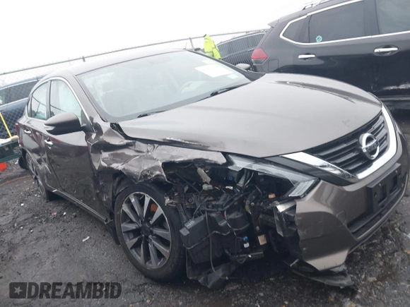 2016 Nissan Altima SV with VIN 1N4AL3AP1GC162811, listed as a IAAI auction lot 41422378 with 58,172 mi miles and . Bid and sale history available at DreamBid. Image 6.