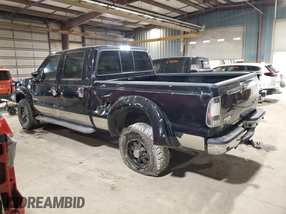 2001 Ford F-350 with VIN 1A040185, listed as a Copart auction lot 87953295 with 212,487 mi miles and Salvage title. Bid and sale history available at DreamBid. Image 2.