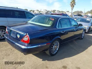 2006 Jaguar XJ with VIN SAJWA79B76SG50210, listed as a IAAI auction lot 41252871 with 66,543 mi miles. Bid and sale history available at carsss.com. Image 4.