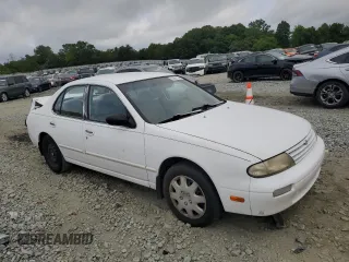 1997 Nissan Altima XE with VIN 1N4BU31D7VC117019, listed as a Copart auction lot 63961254 with 224,947 mi miles and Salvage Title. Bid and sale history available at carsss.com. Image 4.