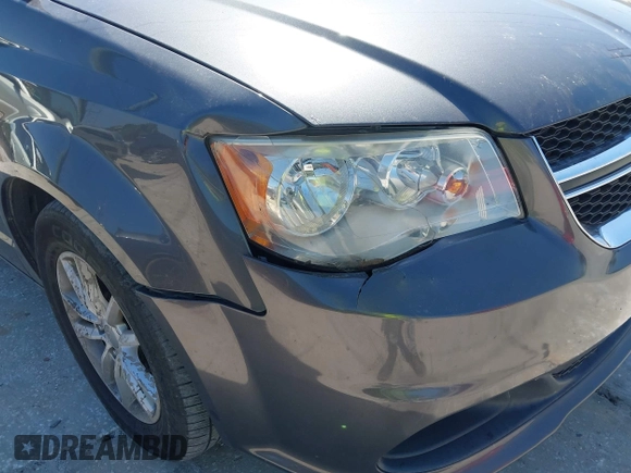 2015 Dodge Grand Caravan SXT with VIN 2C4RDGCG1FR556846, listed as a IAAI auction lot 42179172 with 120,170 mi miles and . Bid and sale history available at DreamBid. Image 6.