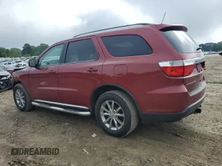 2013 Dodge Durango SXT with VIN 1C4RDHAG4DC692743, listed as a Copart auction lot 56651175 with 176,949 mi miles and Clean title. Bid and sale history available at DreamBid. Image 2.