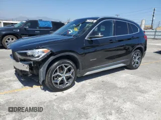2017 BMW X1 sDrive28i z VIN WBXHU7C35HP924607, wystawiony jako Copart lot #57346625 z przebiegiem 67 806 mil mil oraz Czysty tytuł • Clean title. Historia ofert i sprzedaży dostępna na DreamBid. Obrazek 1.