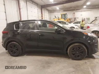 2018 Kia Sportage LX with VIN KNDPM3AC6J7417371, listed as a IAAI auction lot 41879390 with 112,944 mi miles and . Bid and sale history available at carsss.com. Image 13.