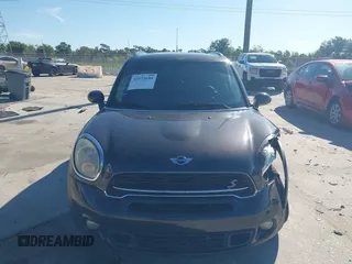 2015 MINI Countryman S with VIN WMWZC3C58FWT04316, listed as a IAAI auction lot 42525698 with 97,046 mi miles and . Bid and sale history available at DreamBid. Image 12.