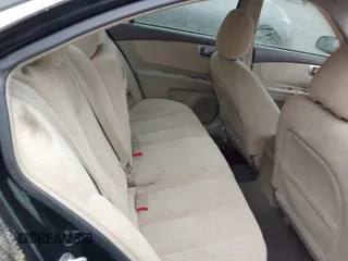 2008 Kia Optima LX z VIN KNAGE123885235142, wystawiony jako IAAI lot #42112119 z przebiegiem 145 410 mil mil oraz . Historia ofert i sprzedaży dostępna na DreamBid. Obrazek 8.