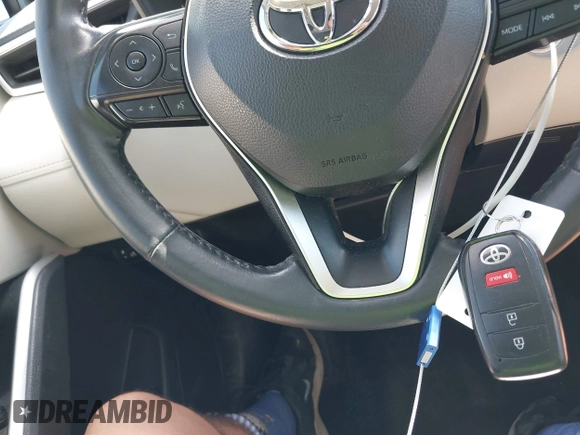 2023 Toyota Corolla Cross LE with VIN 7MUCAAAGXPV045651, listed as a IAAI auction lot 42006289 with 23,282 mi miles and . Bid and sale history available at DreamBid. Image 11.