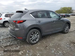 2019 Mazda CX-5 Signature with VIN JM3KFBEY3K0521581, listed as a Copart auction lot 53112925 with 62,977 mi miles and Salvage Title. Bid and sale history available at carsss.com. Image 3.
