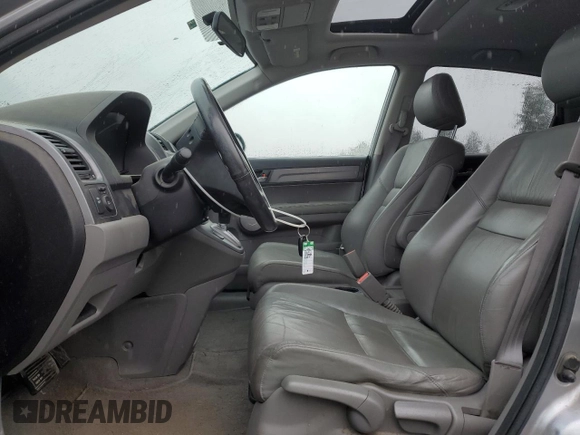 2007 Honda CR-V EX-L z VIN JHLRE48787C004147, wystawiony jako Copart lot #58775825 z przebiegiem 156 059 mil mil oraz Szkoda całkowita • Salvage title. Historia ofert i sprzedaży dostępna na DreamBid. Obrazek 7.