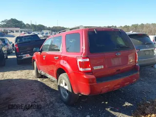 2011 Ford Escape XLT with VIN 1FMCU0D76BKB89698, listed as a IAAI auction lot 41073661 with 124,479 mi miles. Bid and sale history available at carsss.com. Image 3.