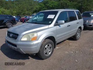 2004 Honda Pilot EX with VIN 2HKYF18504H556213, listed as a IAAI auction lot 42137221 with 225,781 mi miles and . Bid and sale history available at DreamBid. Image 2.