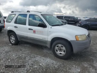 2001 Ford Escape XLS with VIN 1FMYU02161KB01283, listed as a Copart auction lot 59145105 with 86,195 mi miles and Salvage title. Bid and sale history available at DreamBid. Image 4.