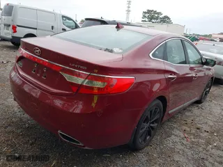 2014 Hyundai Azera Limited with VIN KMHFH4JG8EA398092, listed as a IAAI auction lot 42046561 with 171,270 mi miles. Bid and sale history available at carsss.com. Image 4.