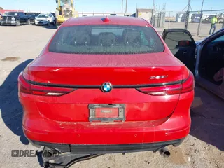 2021 BMW 2 Series 228i with VIN WBA53AK0XM7J01878, listed as a IAAI auction lot 41251154 with 61,199 mi miles. Bid and sale history available at carsss.com. Image 16.