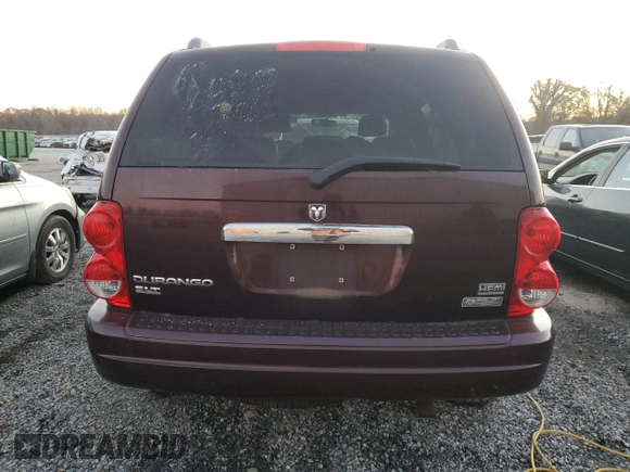2005 Dodge Durango SLT z VIN 1D4HD48DX5F509039, wystawiony jako Copart lot #82547404 z przebiegiem 325 159 mil mil oraz Szkoda całkowita • Salvage title. Historia ofert i sprzedaży dostępna na DreamBid. Obrazek 6.