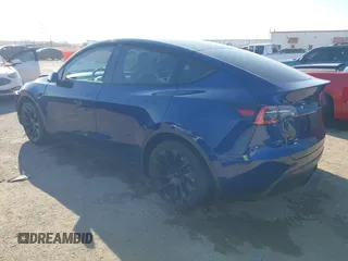 2021 Tesla Model Y Standard Range with VIN 5YJYGDED5MF121874, listed as a IAAI auction lot 41238170 with 72,041 mi miles and . Bid and sale history available at DreamBid. Image 3.