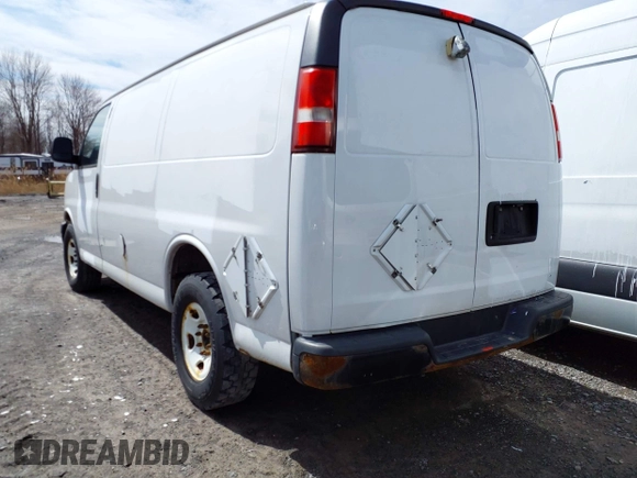 2014 Chevrolet Express Cargo Van with VIN 1GCWGFCA0E1205946, listed as a IAAI auction lot 41685687 with 317,212 mi miles. Bid and sale history available at carsss.com. Image 3.