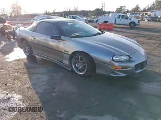 1999 Chevrolet Camaro Z28 z VIN 2G1FP22G8X2125177, wystawiony jako IAAI lot #41140970 z przebiegiem 190 062 mil mil oraz . Historia ofert i sprzedaży dostępna na DreamBid. Obrazek 1.