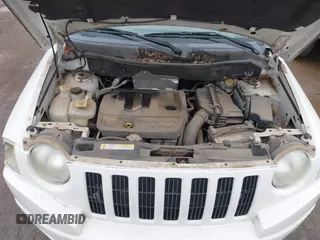 2007 Jeep Compass Sport with VIN 1J8FF47W27D138211, listed as a IAAI auction lot 41959389 with 165,834 mi miles. Bid and sale history available at carsss.com. Image 10.