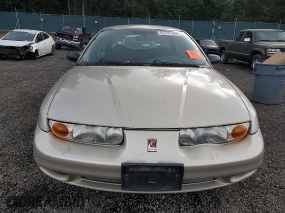 2001 Saturn SL z VIN 1G8ZG52851Z213567, wystawiony jako Copart lot #51795795 z przebiegiem Nie podano mil oraz Szkoda całkowita • Salvage title. Historia ofert i sprzedaży dostępna na DreamBid. Obrazek 5.