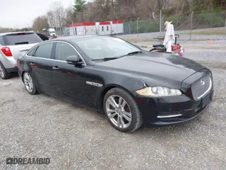2012 Jaguar XJ with VIN SAJWA2GBXCLV32998, listed as a IAAI auction lot 41954979 with 1 mi miles. Bid and sale history available at carsss.com. Image 1.