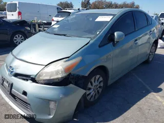 2014 Toyota Prius Plug-In with VIN JTDKN3DP5E3058694, listed as a IAAI auction lot 41840228 with NaN miles. Bid and sale history available at carsss.com. Image 2.