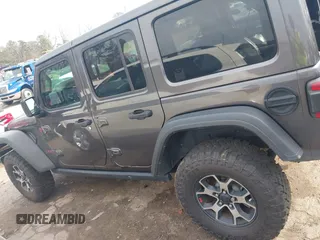 2020 Jeep Wrangler Unlimited Rubicon z VIN 1C4HJXFN8LW176002, wystawiony jako IAAI lot #41662158 z przebiegiem 55 924 mil mil oraz . Historia ofert i sprzedaży dostępna na DreamBid. Obrazek 14.